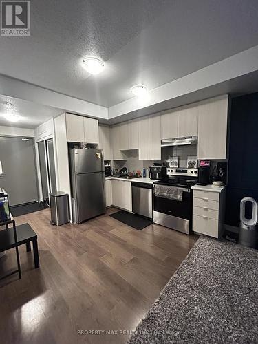#402 -20 Orchid Place Dr, Toronto, ON - Indoor Photo Showing Kitchen