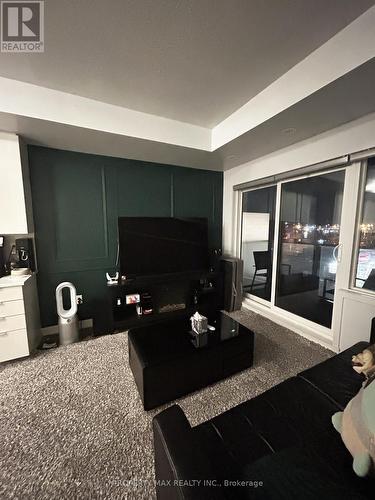 #402 -20 Orchid Place Dr, Toronto, ON - Indoor Photo Showing Living Room