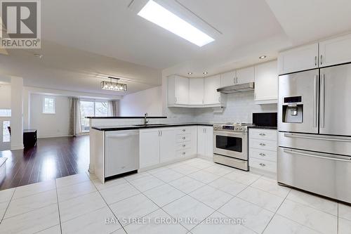 #233 -1881 Mcnicoll Ave, Toronto, ON - Indoor Photo Showing Kitchen