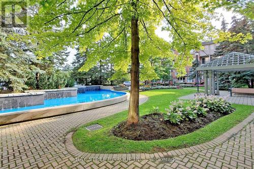 233 - 1881 Mcnicoll Avenue, Toronto, ON - Outdoor With Backyard