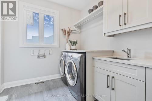 7 Walter James Pkwy, Springwater, ON - Indoor Photo Showing Laundry Room