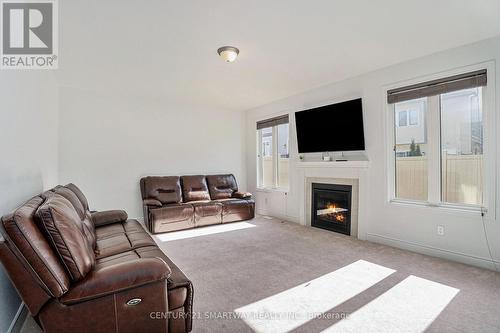 542 Millars Sound Way, Ottawa, ON - Indoor Photo Showing Living Room With Fireplace
