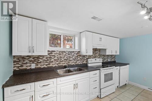 134 Victor Blvd, Hamilton, ON - Indoor Photo Showing Kitchen With Double Sink