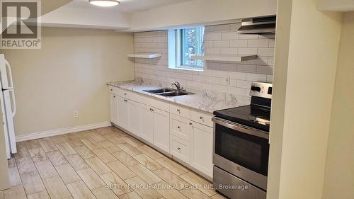 #Lower -7 Lunness Rd, Toronto, ON - Indoor Photo Showing Kitchen With Double Sink