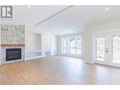 333 Sandhill Crescent, 100 Mile House, BC - Indoor Photo Showing Living Room With Fireplace