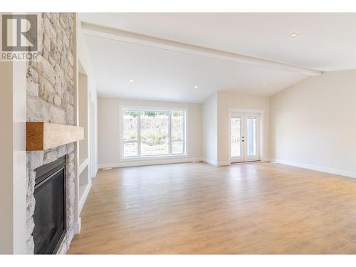 333 Sandhill Crescent, 100 Mile House, BC - Indoor Photo Showing Living Room With Fireplace