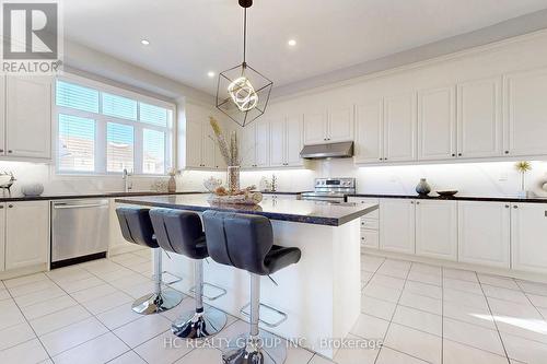 56 Redmond Cres, Springwater, ON - Indoor Photo Showing Kitchen With Upgraded Kitchen