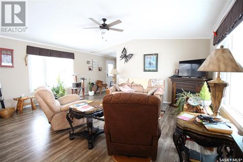 18 Burgess Street, Fleming, SK - Indoor Photo Showing Living Room With Fireplace