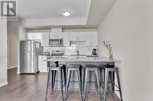 #313 -35 Kingsbury Sq, Guelph, ON - Indoor Photo Showing Kitchen With Stainless Steel Kitchen With Upgraded Kitchen