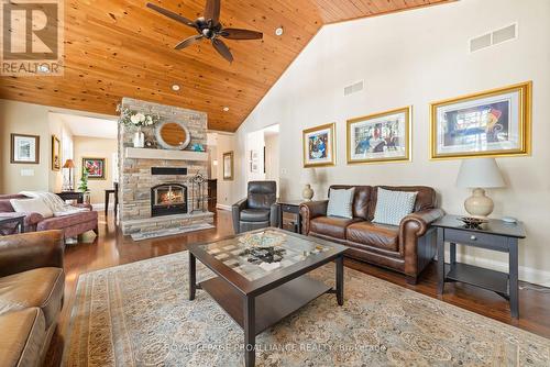 1386 North Shore Road, North Frontenac, ON - Indoor Photo Showing Living Room With Fireplace