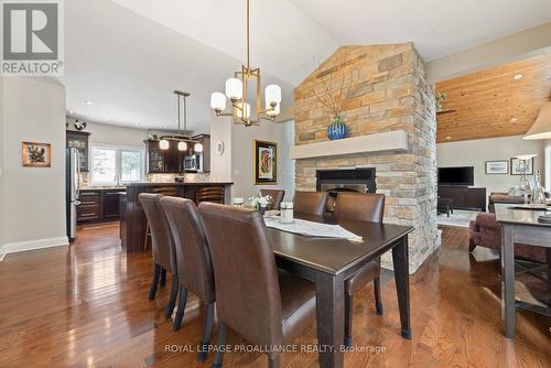 1386 North Shore Road, North Frontenac, ON - Indoor Photo Showing Dining Room With Fireplace