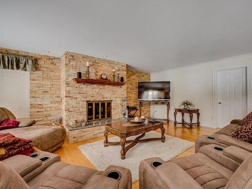 Living room - 247 Ch. Des Cèdres, Sainte-Anne-Des-Lacs, QC - Indoor Photo Showing Living Room With Fireplace