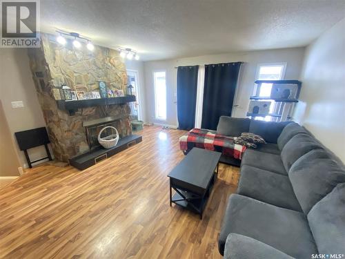 62 Haultain Avenue, Yorkton, SK - Indoor Photo Showing Living Room With Fireplace