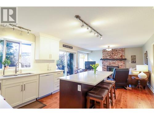 772 Balsam Avenue, Penticton, BC - Indoor Photo Showing Kitchen With Fireplace With Double Sink