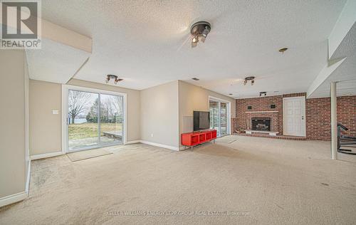 572 Fralicks Beach Rd, Scugog, ON - Indoor Photo Showing Other Room With Fireplace