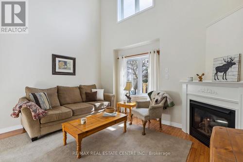 265 Doon Mills Dr, Kitchener, ON - Indoor Photo Showing Living Room With Fireplace