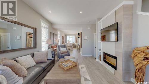 4744 Buckingham Drive, Regina, SK - Indoor Photo Showing Living Room With Fireplace