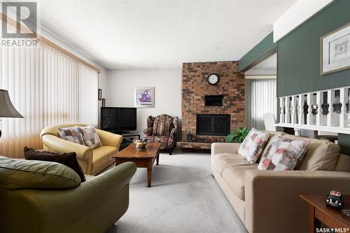 390 Fairview Road, Regina, SK - Indoor Photo Showing Living Room With Fireplace