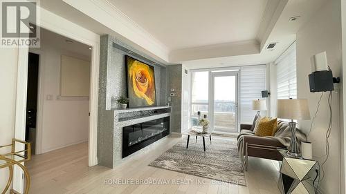 #303 -15 Stollery Pond Cres, Markham, ON - Indoor With Fireplace