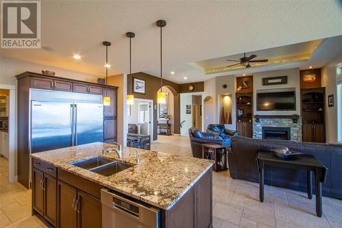 5071 Lipkovits Road, Kelowna, BC - Indoor Photo Showing Kitchen With Fireplace With Double Sink With Upgraded Kitchen