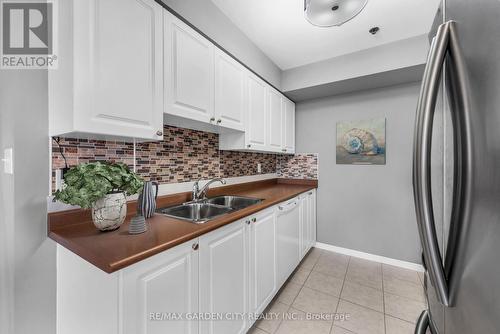 1204 - 330 Prince Charles Drive S, Welland, ON - Indoor Photo Showing Kitchen With Double Sink