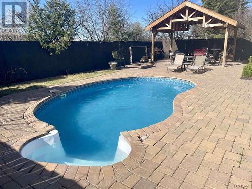 1059 Michener Blvd, Timmins, ON - Outdoor With In Ground Pool With Backyard