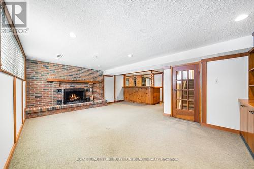 115 Santa Barbara Rd, Toronto, ON - Indoor Photo Showing Other Room With Fireplace