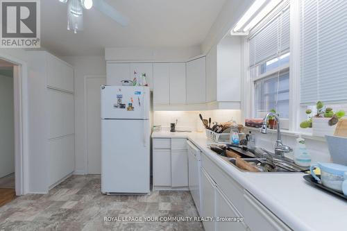 203 High Park Ave, Toronto, ON - Indoor Photo Showing Kitchen With Double Sink