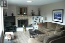 307 Nelson Avenue, Nakusp, BC  - Indoor Photo Showing Living Room With Fireplace 