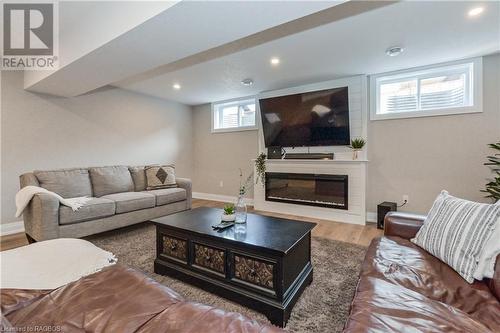 100 Ronnies Way, Mount Forest, ON - Indoor Photo Showing Living Room With Fireplace