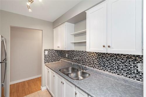 4209 Hixon Street|Unit #110, Beamsville, ON - Indoor Photo Showing Kitchen With Double Sink