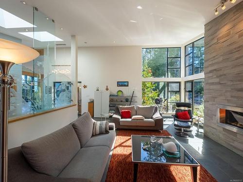 2430 Jolly Brothers Rd, Gabriola Island, BC - Indoor Photo Showing Living Room With Fireplace