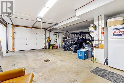 Heated large workshop/garage - 20 Moore Street, Lions Head, ON - Indoor Photo Showing Garage