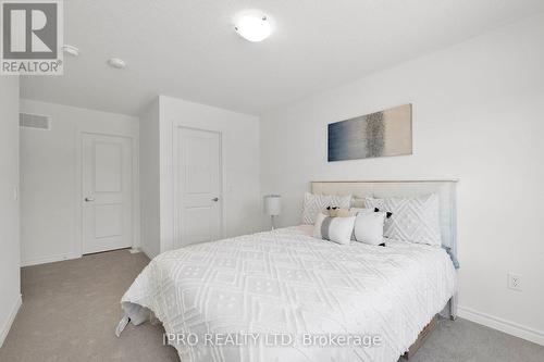 26 Sassafras Road, Springwater, ON - Indoor Photo Showing Bedroom