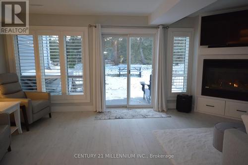 8 - 15 28Th Street N, Wasaga Beach, ON - Indoor Photo Showing Other Room With Fireplace