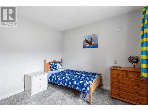 414 Curlew Drive, Kelowna, BC - Indoor Photo Showing Bedroom