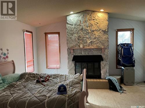 122 Edward Street, Hazenmore, SK - Indoor Photo Showing Living Room With Fireplace