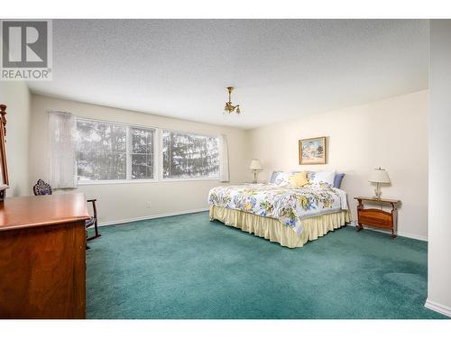 7688 Tronson Road, Vernon, BC - Indoor Photo Showing Bedroom