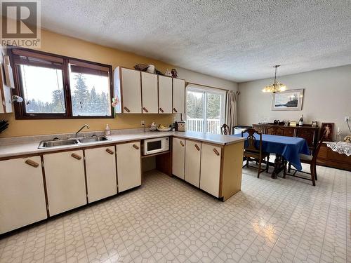 2987 Likely Road, 150 Mile House, BC - Indoor Photo Showing Kitchen With Double Sink