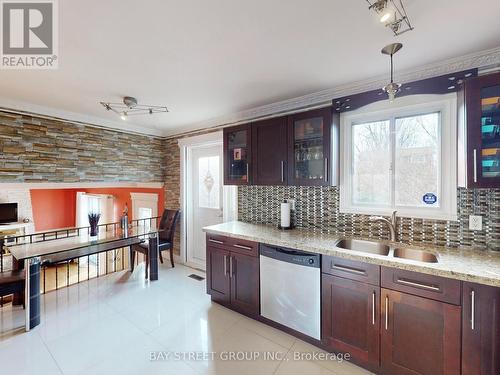 2295 Council Ring Rd, Mississauga, ON - Indoor Photo Showing Kitchen With Double Sink