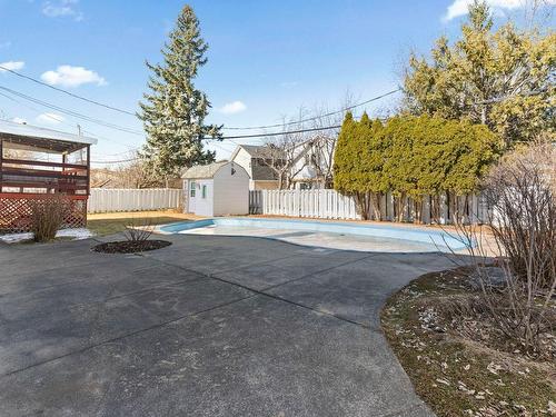 Backyard - 4005 Rue Acadia, Laval (Chomedey), QC - Outdoor With In Ground Pool