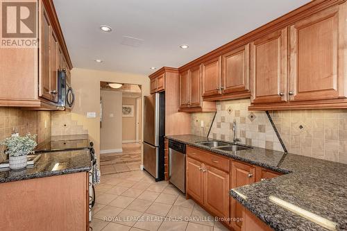 201 - 2170 Marine Drive, Oakville, ON - Indoor Photo Showing Kitchen With Double Sink With Upgraded Kitchen