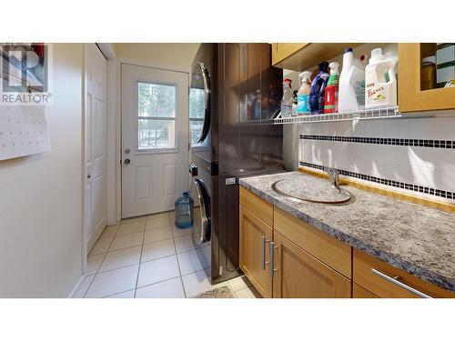 4838 Kitwanga Drive, 108 Mile Ranch, BC - Indoor Photo Showing Laundry Room