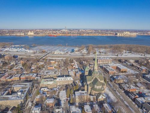 Aerial photo - 32 Rue St-Charles O., Longueuil (Le Vieux-Longueuil), QC - Outdoor With Body Of Water With View