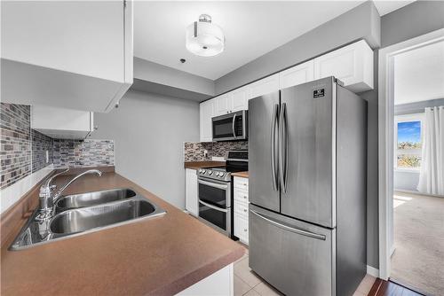 330 Prince Charles Drive S|Unit #1204, Welland, ON - Indoor Photo Showing Kitchen With Stainless Steel Kitchen With Double Sink