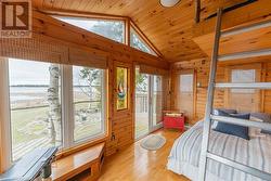 treehouse/bunkie with a wall of windows looking out to Lake Huron - 