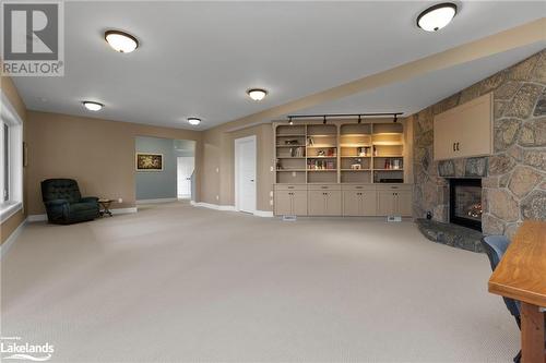 Lower Recreation Room - 82 Louisa Street, Parry Sound, ON - Indoor With Fireplace