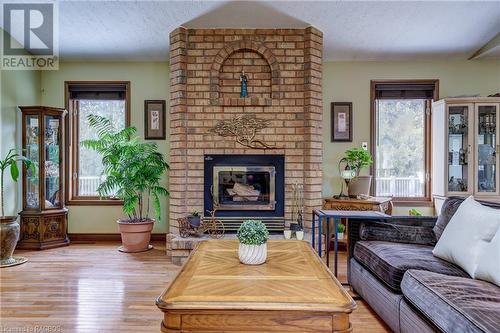 193416 Sideroad 30 Ndr, West Grey, ON - Indoor Photo Showing Living Room With Fireplace