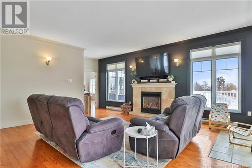 9 Heron Court, Bouctouche, NB - Indoor Photo Showing Living Room With Fireplace