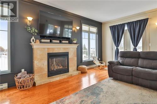 9 Heron Court, Bouctouche, NB - Indoor Photo Showing Living Room With Fireplace